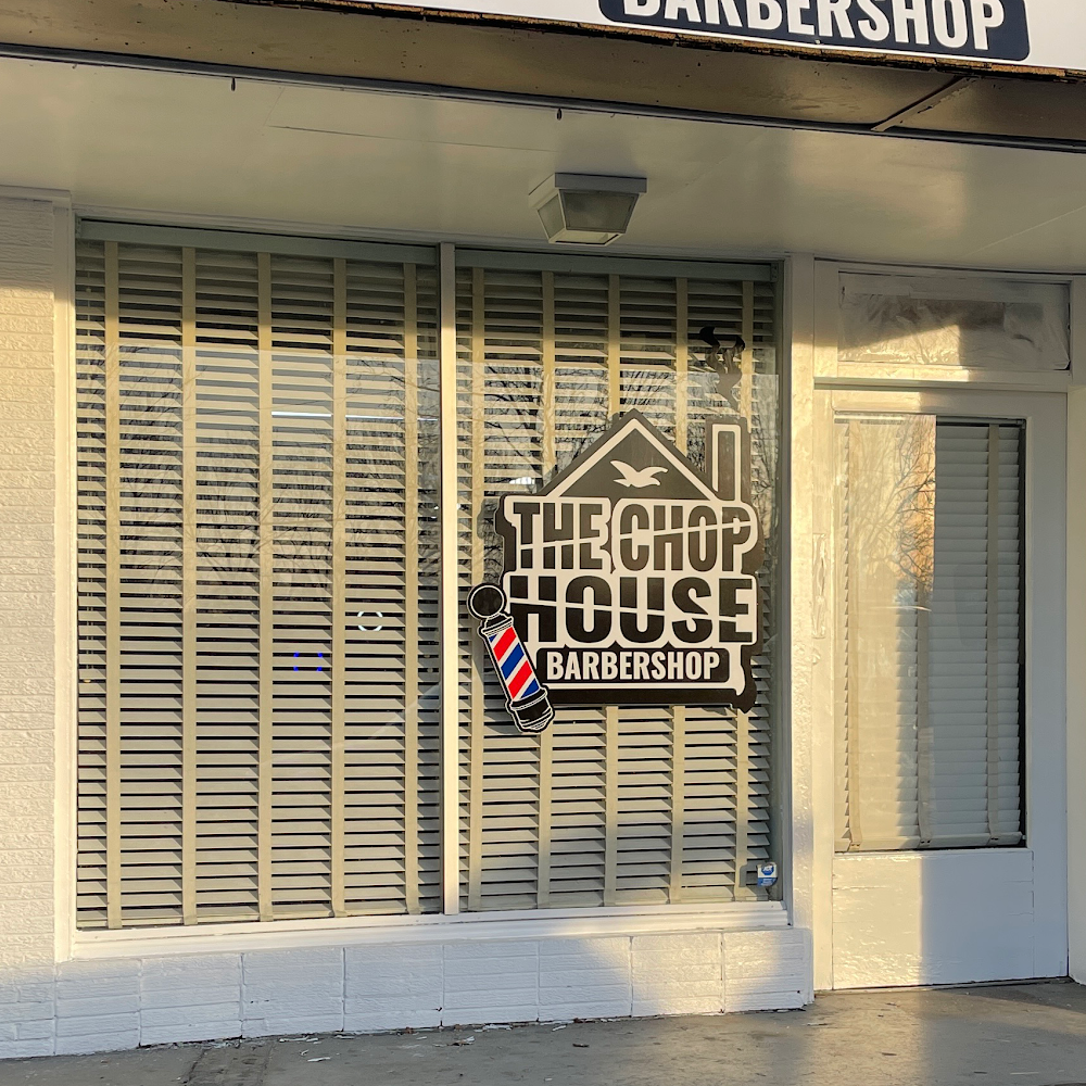 The Chop House Barbershop storefront with barber pole signage